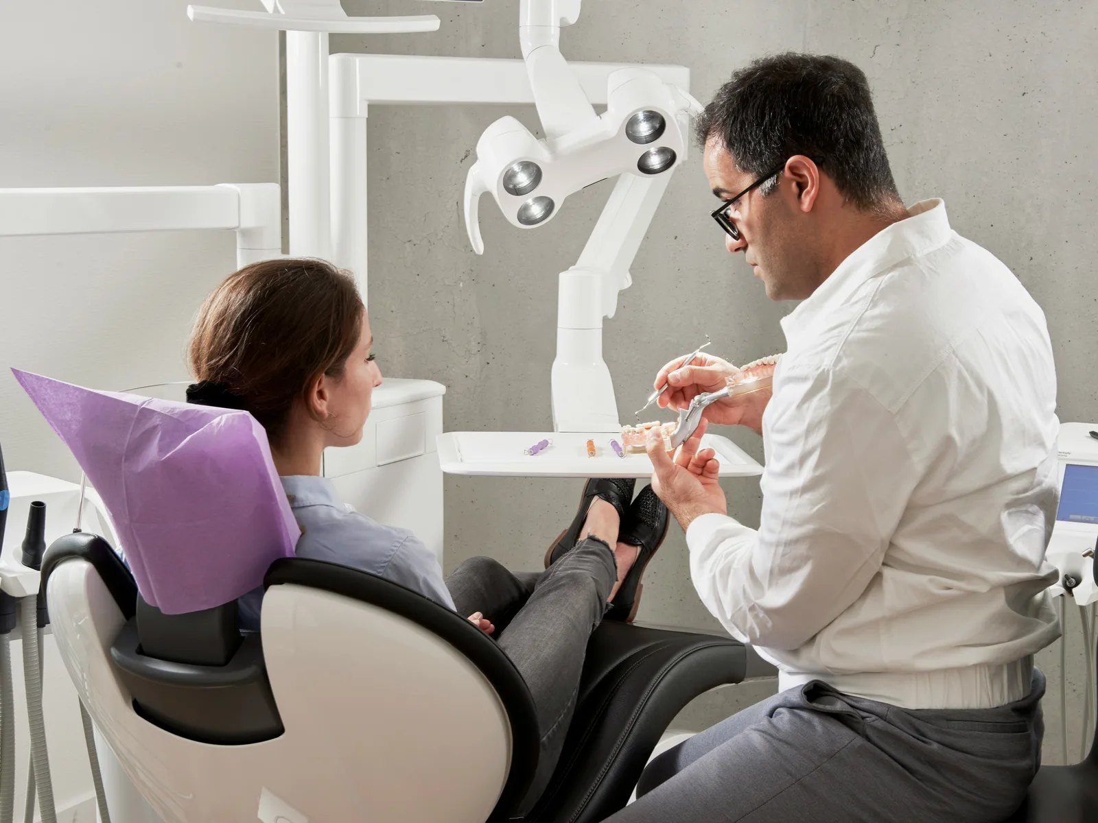 Implant consultation with a patient, at the implant practice in Winnipeg
