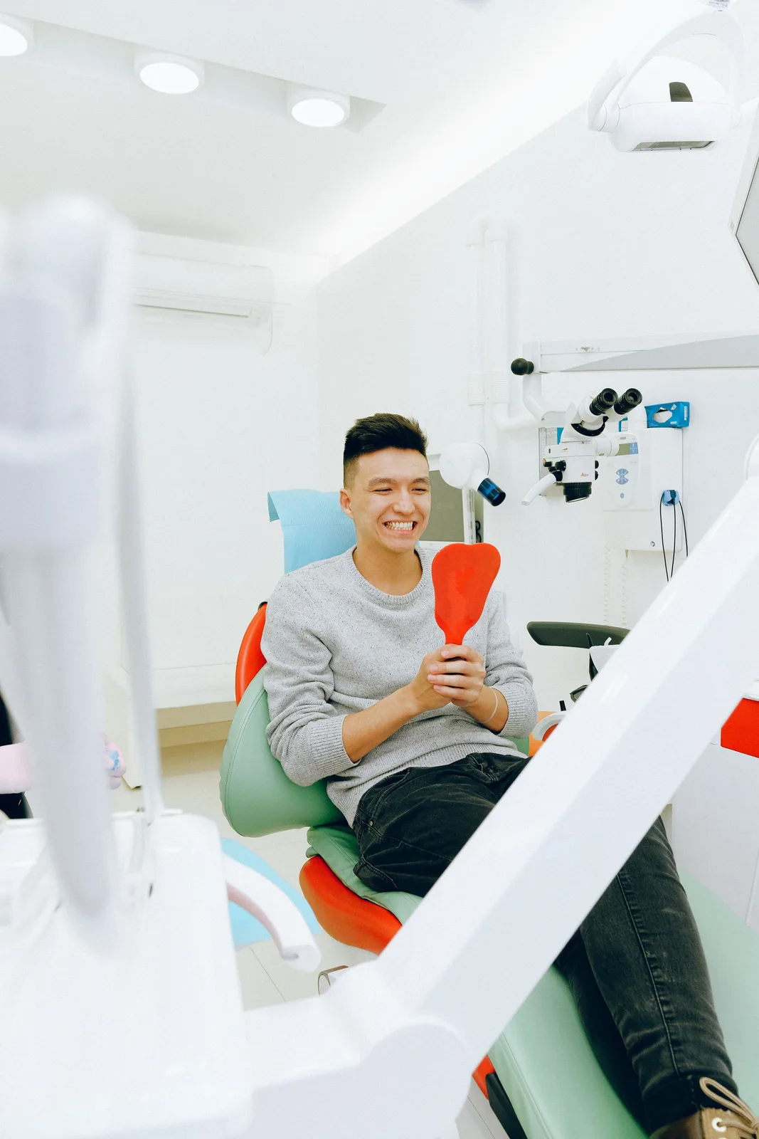Young patient pleased with the result, referred to in the Front Tooth Implant section for Winnipeg